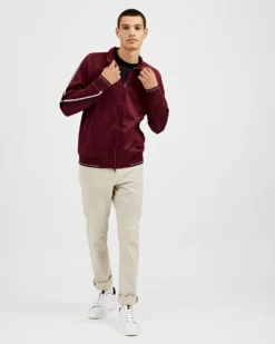 Oved Loungewear Asymmetrical Striped-Sleeve Track Jacket - Port Royal